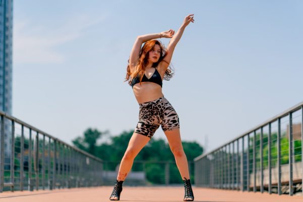 street dancing Sexy young fit woman in heels dancing heels on the street in city hobby active lifestyle seduction street dancing Sexy young fit woman in heels dancing heels on the street in city hobby active lifestyle seduction