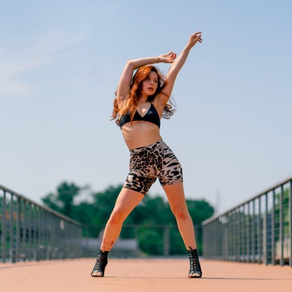 street dancing Sexy young fit woman in heels dancing heels on the street in city hobby active lifestyle seduction